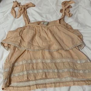 Orange creme ruffled tie tank top